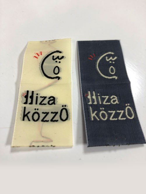 手書きでデザインしたものをネームタグに加工した例